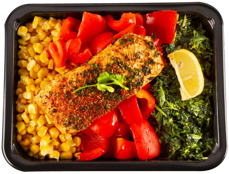 Portioned and cooked  meal plated in a meal prep container. Great for mind and body performance.
