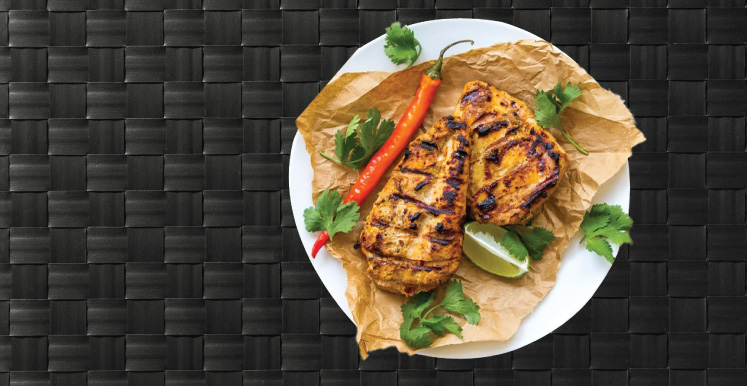 whole chicken on a plate