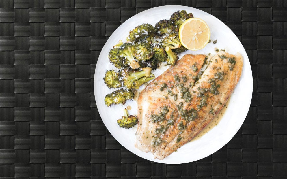 Lean white fish fillet broiled with natural herbs, lemon and served with broccoli.