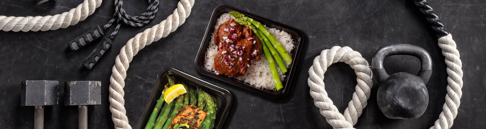 Heatlhy  meals served in a microwave safe  meal prep containers