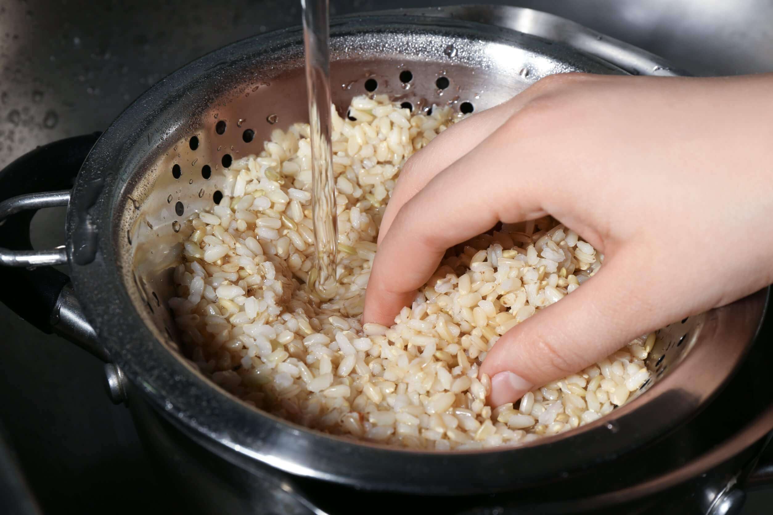 Washing Rice Under Running Water