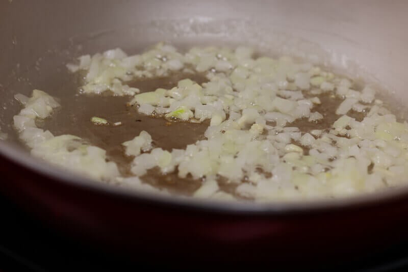 Add the minced onion to the pan