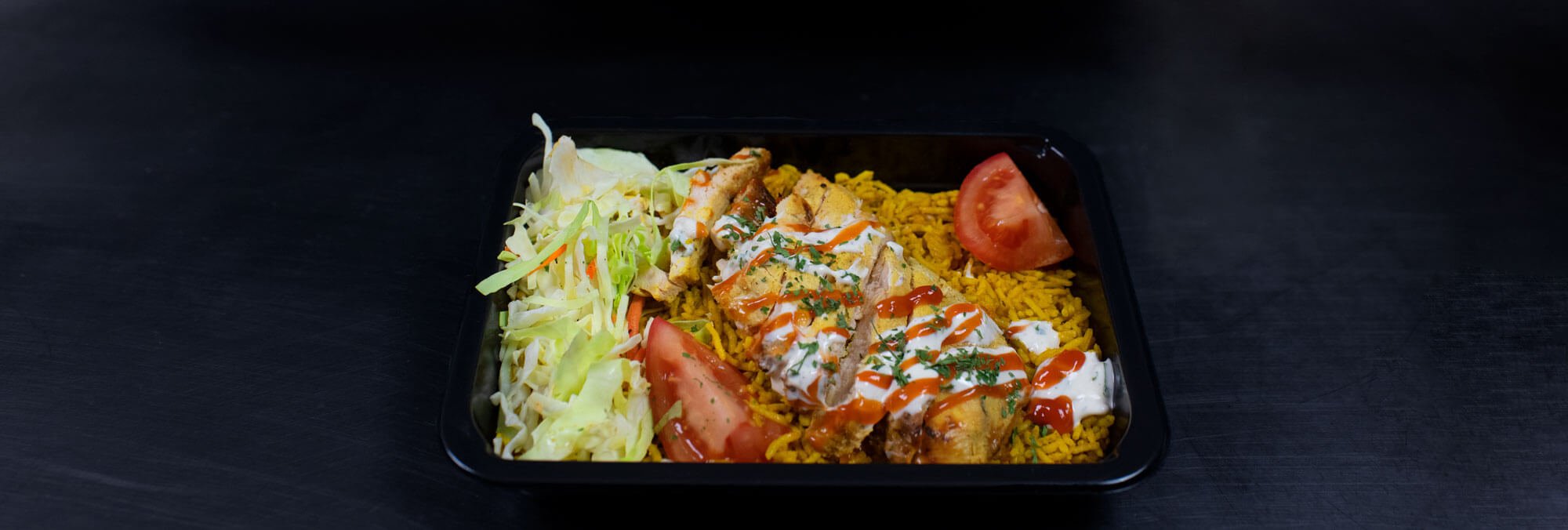 Healthy halal meals served in a microwave safe halal meal prep containers