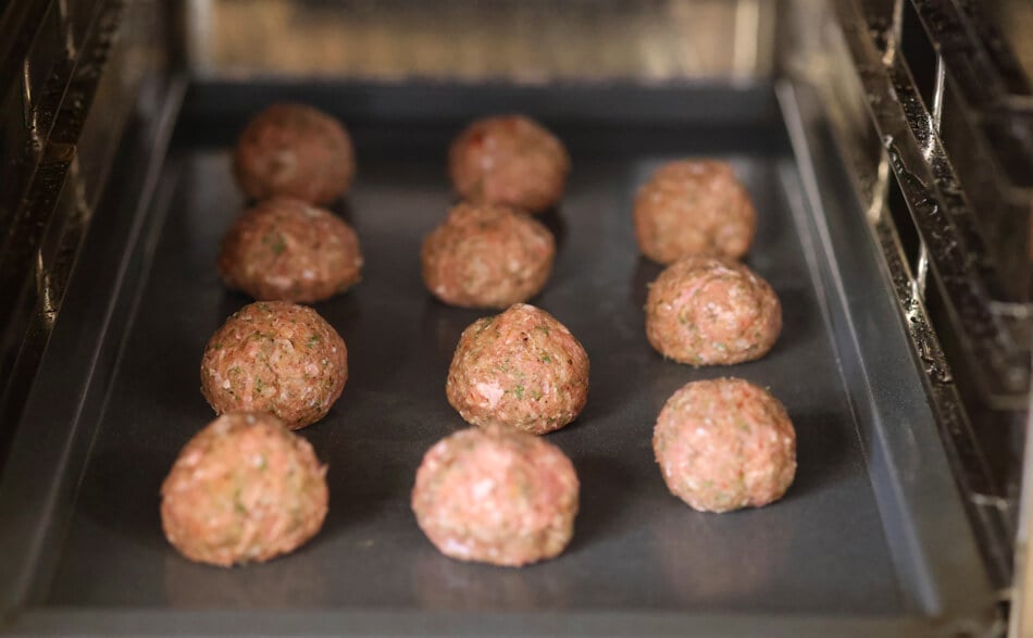 keto meatballs cooking in oven