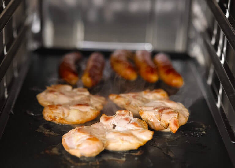 chicken and sausage cooked in the oven
