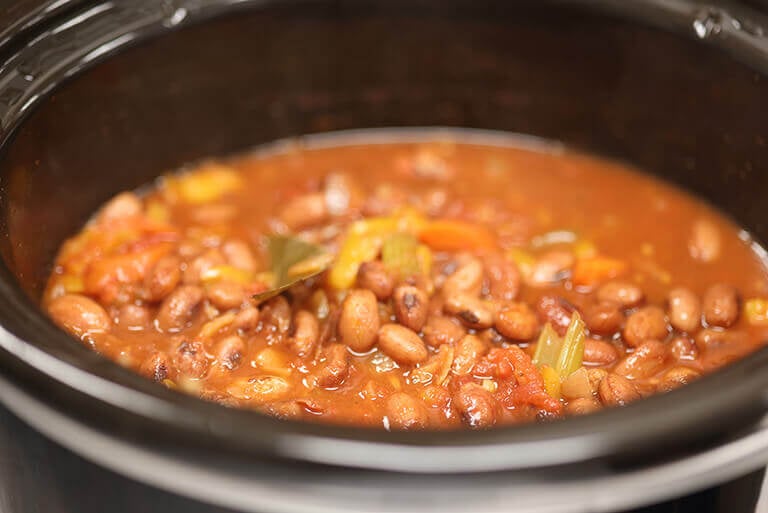 simmering pinto stew in crockpot