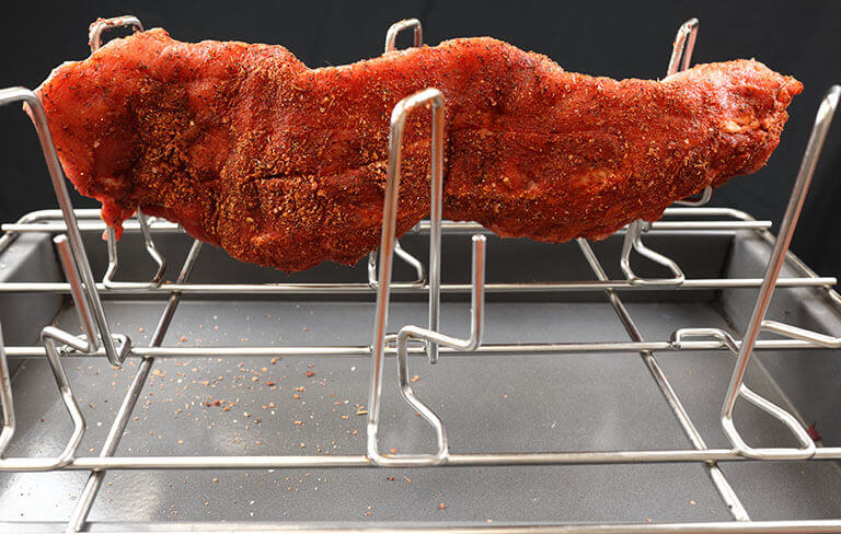 seasoned ribs on oven rack