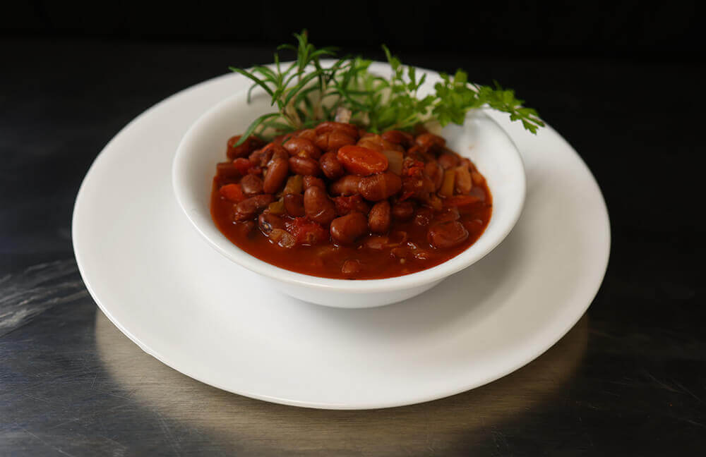 crockpot pinto beans plated and garnished