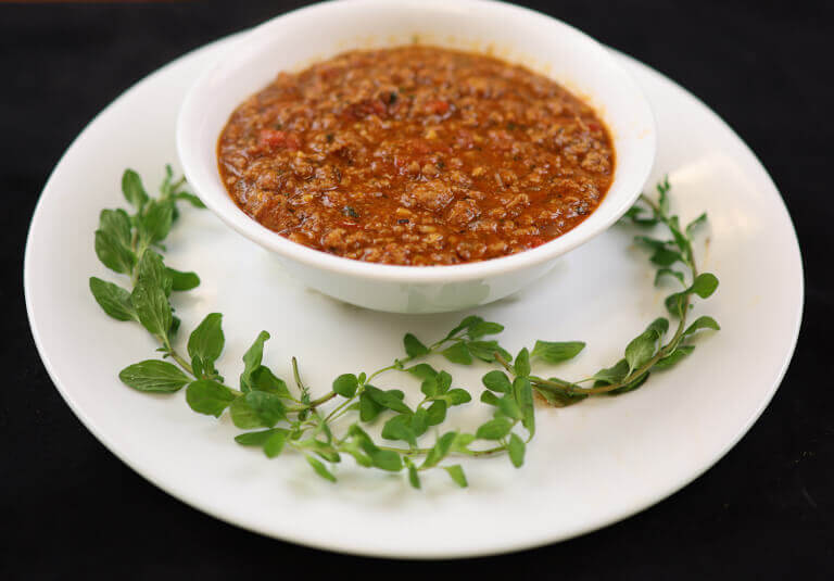 no-bean chili plated garnished