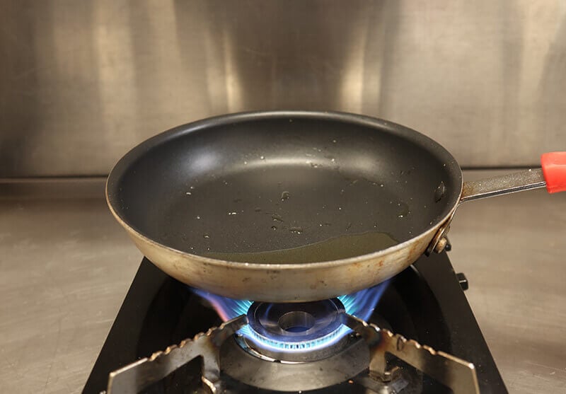 pan on burner with oil