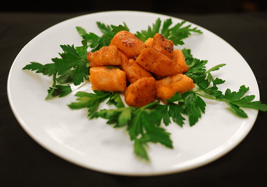 sweet potato gnocchi plated and garnished