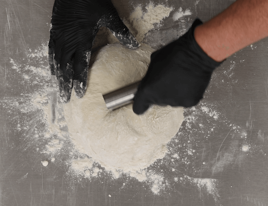 portioning the dough into two equal loaves