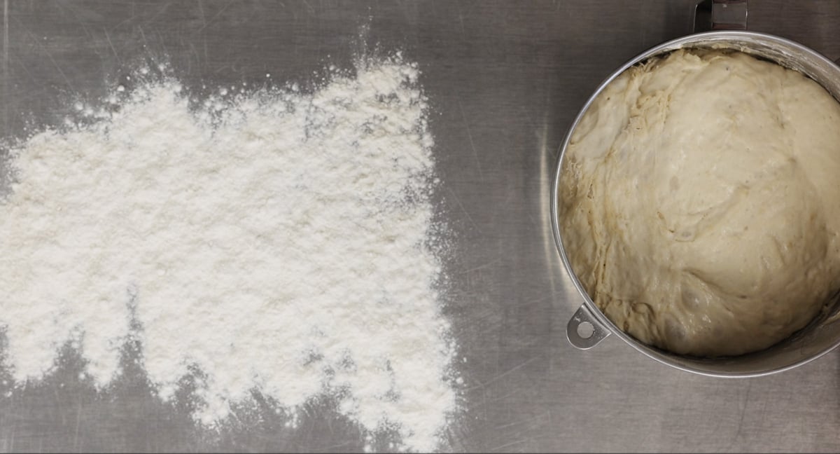 portioning the dough into two equal loaves