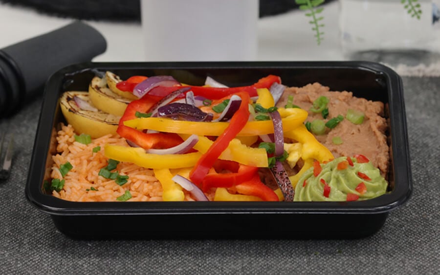 Healthy veggie meals plated in a microwave safe meal prep container
