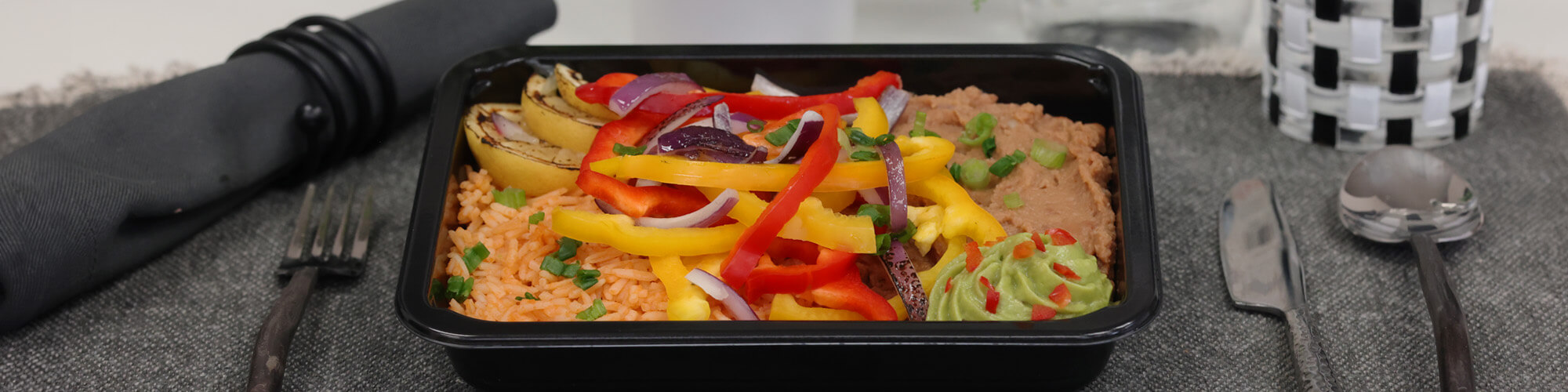 Healthy vegetarian meals served in a microwave safe meal prep containers