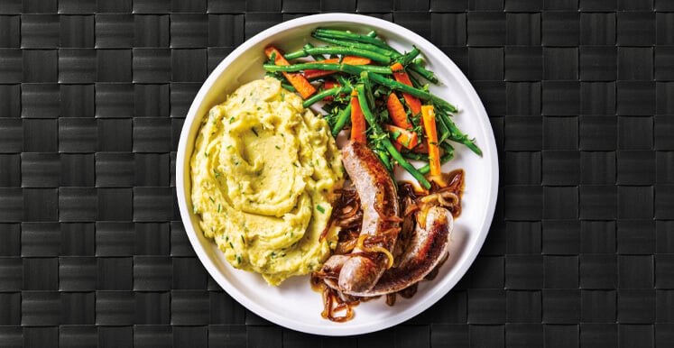 Polish sausage, mashed potatoes or cauliflower, and vegetables
