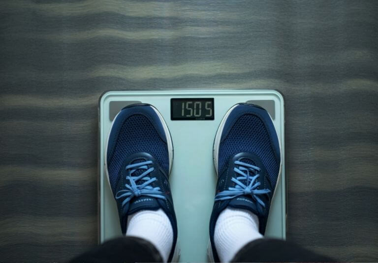 weight loss and standing on a scale